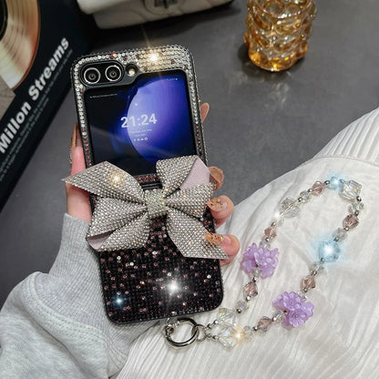 Luxury Crystal Flower Bow Diamond Wrist Chain Case for Samsung Galaxy Z Flip.